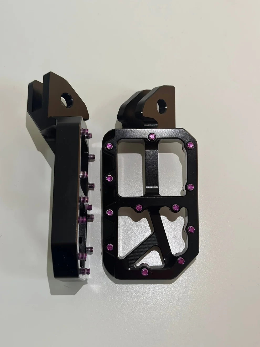 Black foot pegs