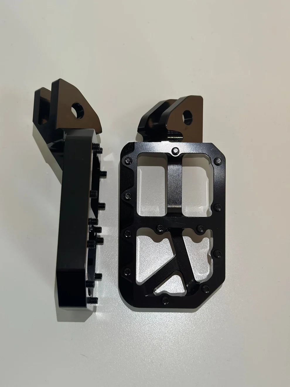 Black foot pegs